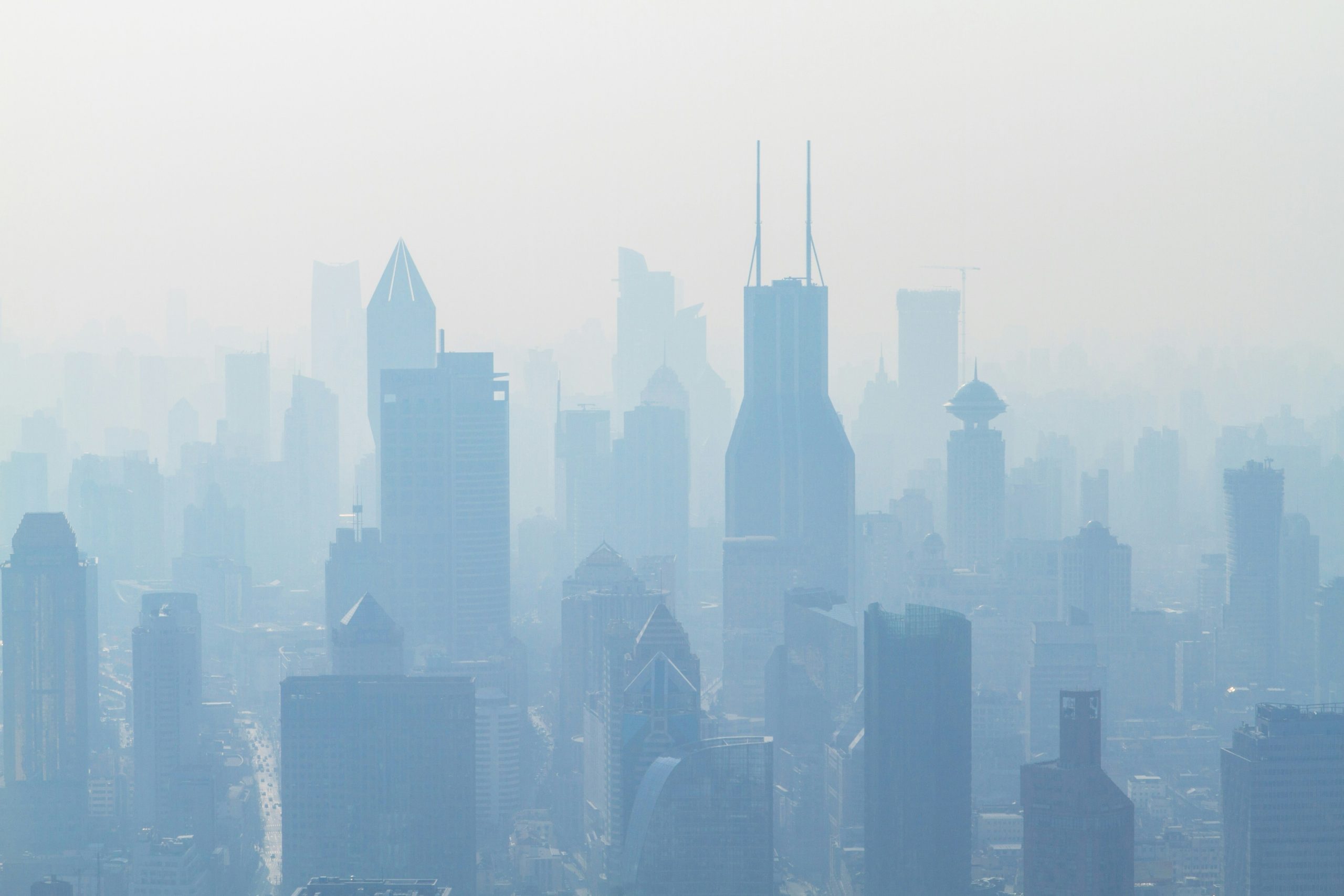 smog-covered skyline of Shanghai, China